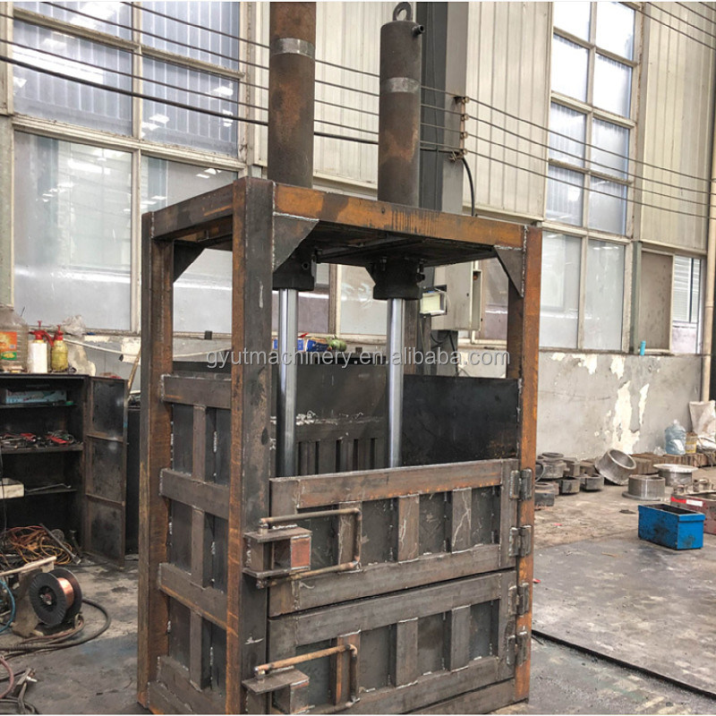 Stand-up pouch verpakkingsvorm karton comprimeren verpakkingsmachine voor afvalpapier gebruikte kleding